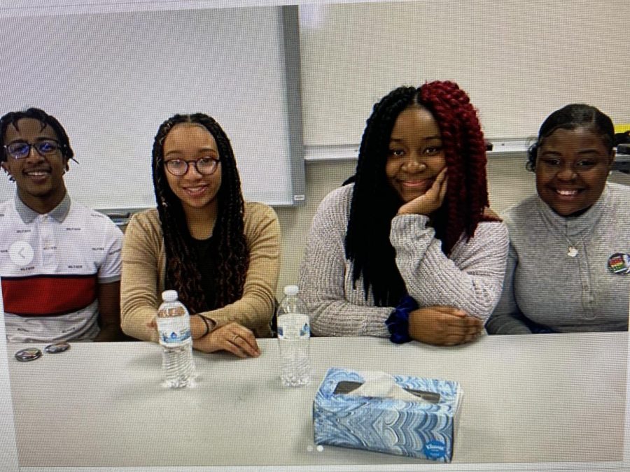 Oshkosh Norths Black Student Union board members presented to staff during professional development time Wednesday, February 12. From left to right: Co-President Ajani Phillips, Secretary Endyiah Simpson, Co-President Alacia (Yoshi) Pettis, and Vice-President Kaprinia Milan.