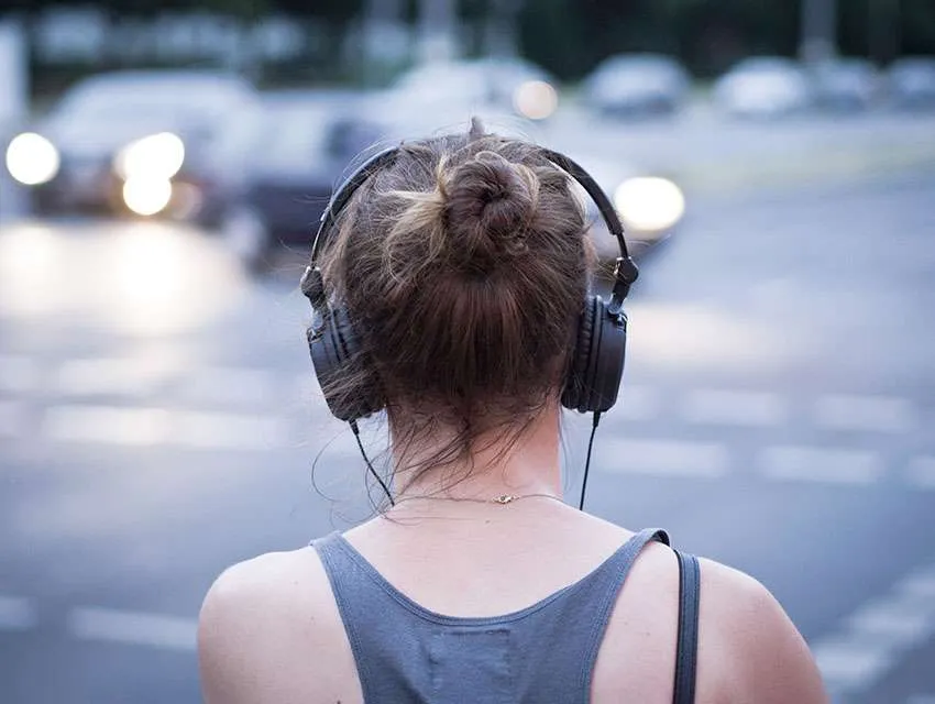 Why are teenagers dependent on headphones?