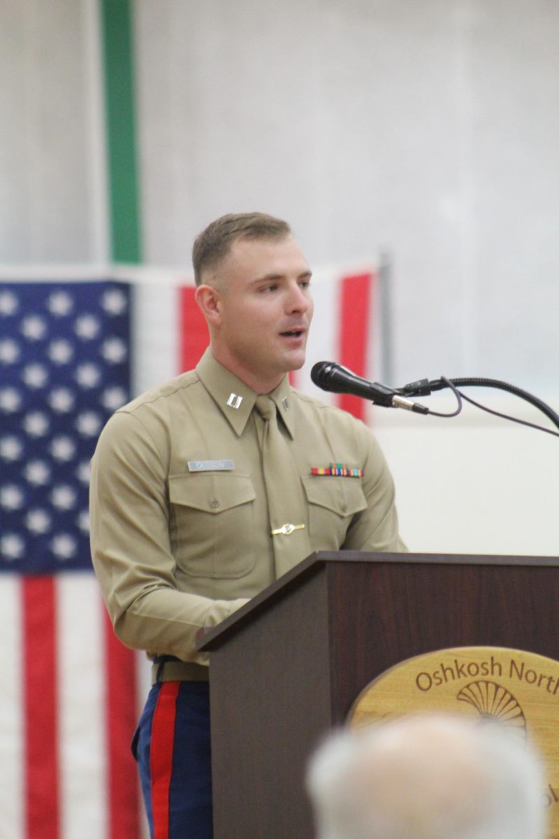 2013+North+graduate+Captain+Jordan+Oleson+delivers+the+keynote+address+at+the+annual+Veterans+Day+assembly+Nov.+9.