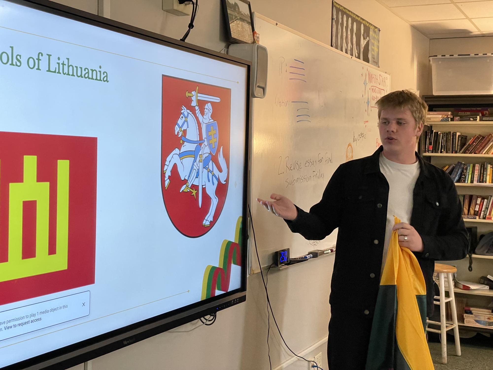 Foreign exchange student Emilijus Daubaras presents to class about his home country.